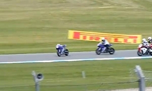 Bike Racers Miss Riderless Motorcycle by Inches