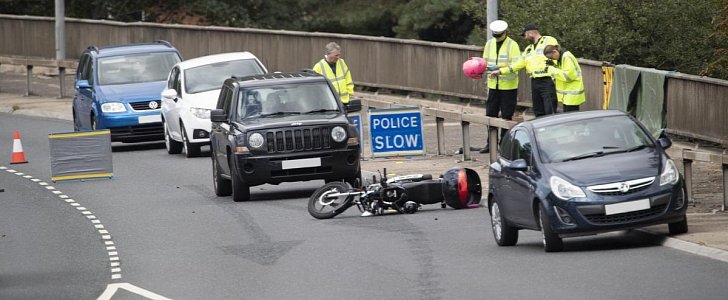 Fatal accident site: biker went down after failing to put high-heel boot back on the pedal