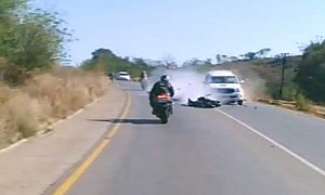 Biker Walks Away From Head On Crash