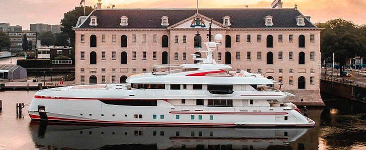 Forever One is a gorgeous white-and-red luxury yacht, custom-built for Bruce Grossman
