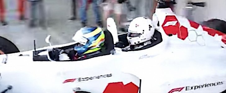 Charaf-Eddin Ait-Tales take a ride in a Formula 1 car