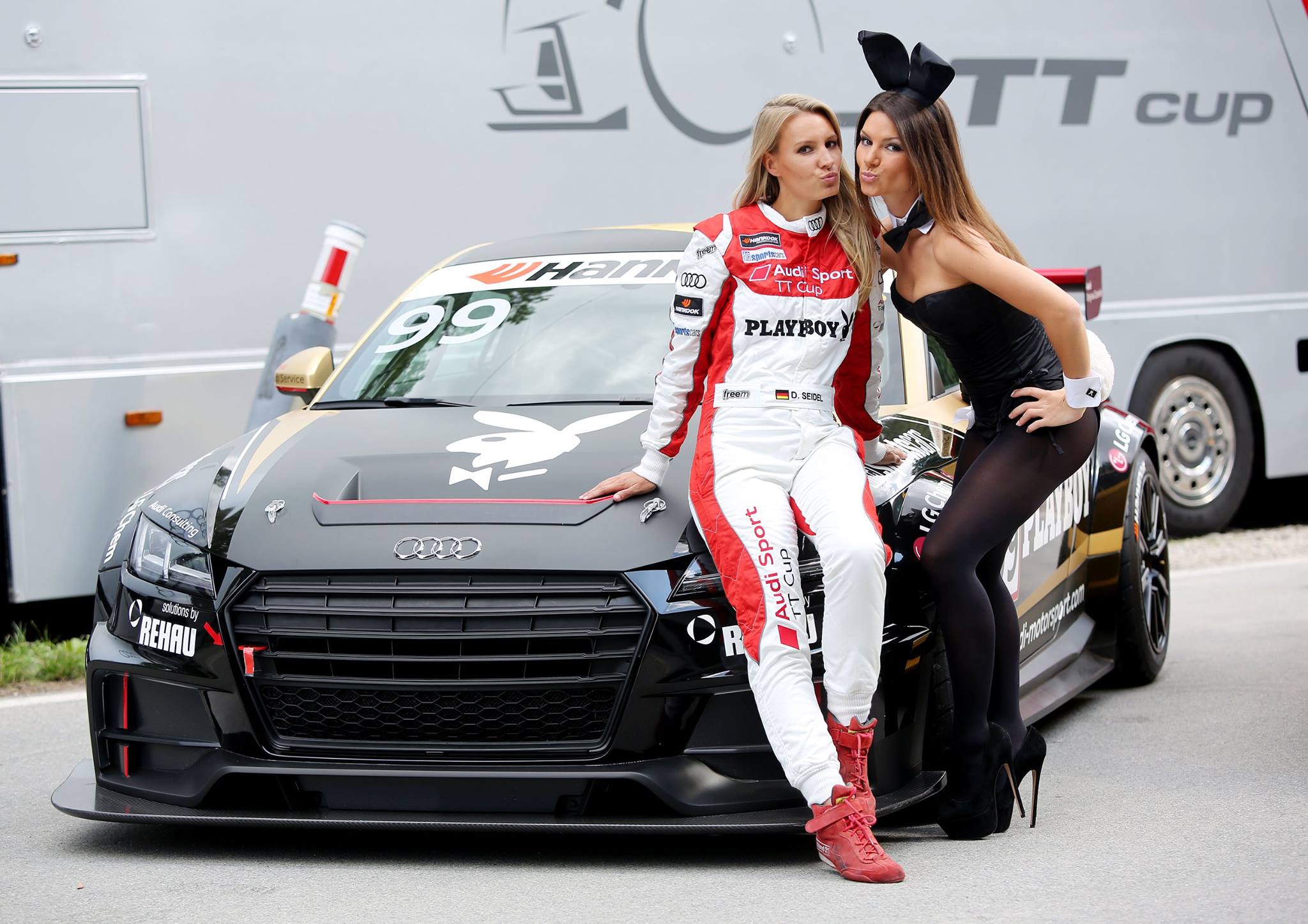 blonde audi race driver does duckface kiss with playboy bunny lol 97174_1