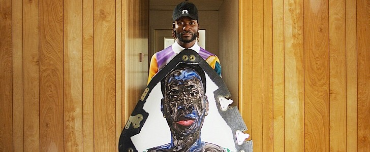 Amoako Boafo and one of his New Shepard paintings