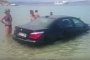 Updated: BMW at the Beach Plows into the Sea as Driver Uses Wrong Pedal