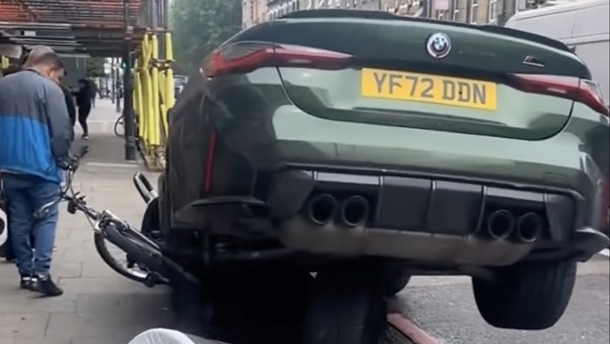 BMW M4 suspended in mid-air after crash in London