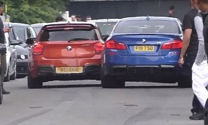 BMW M5 Crashes into M135i while Attempting a Burnout at British Car Meet