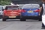 BMW M5 Crashes into M135i while Attempting a Burnout at British Car Meet