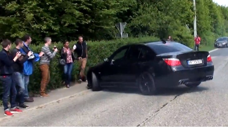 BMW E60 M5 nearly crashing into crowd