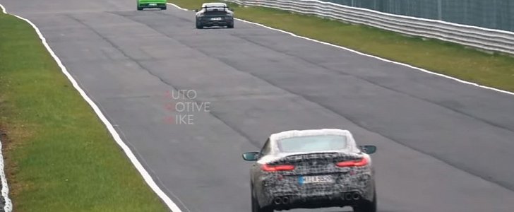 BMW M8 Chases 992 Porsche 911 GT3 on Nurburgring