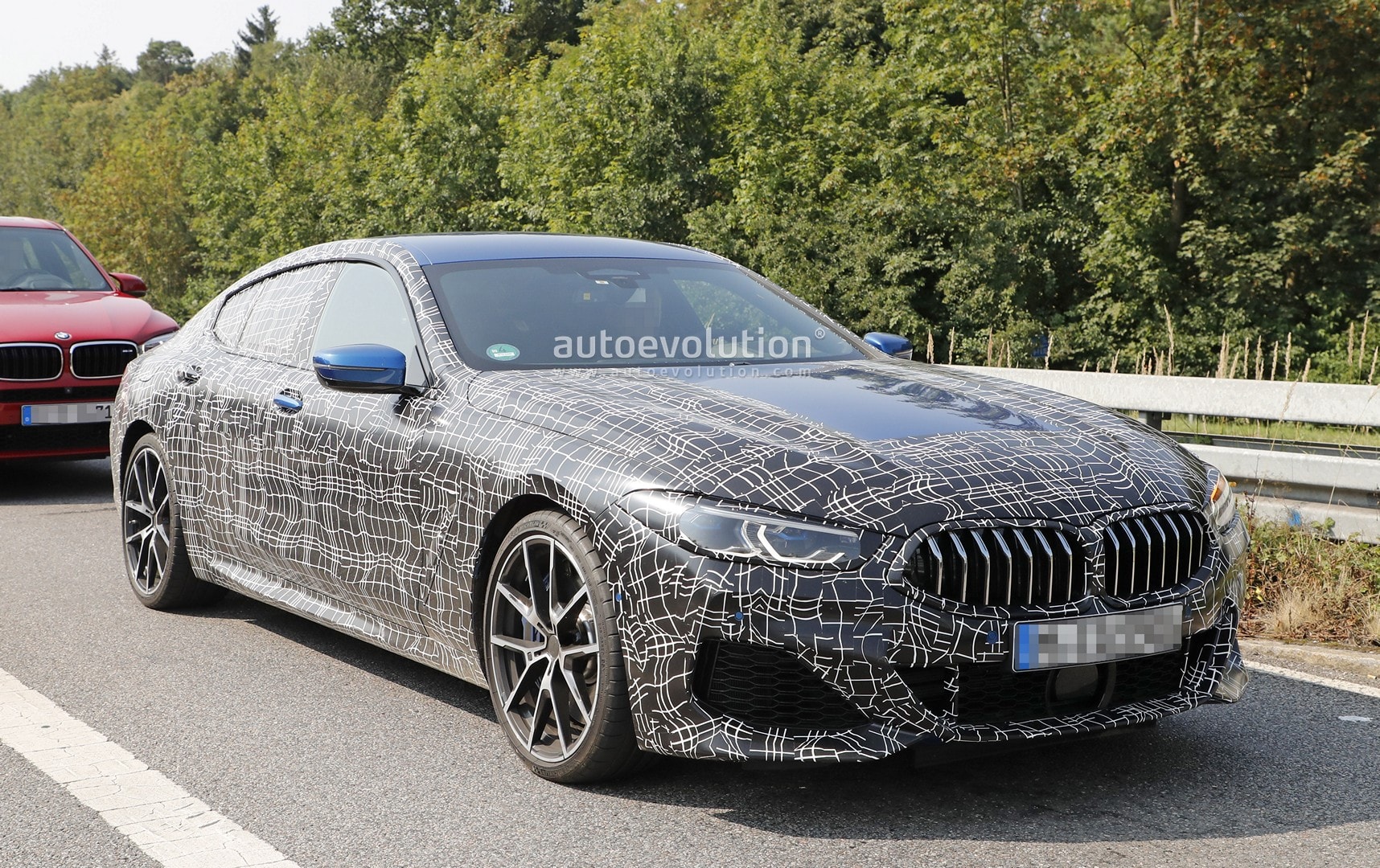 [Imagen: bmw-m850i-gran-coupe-spied-in-traffic-lo...7850_1.jpg]