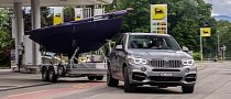 BMW X5 M50d Spotted Towing a Sailboat in Geneva
