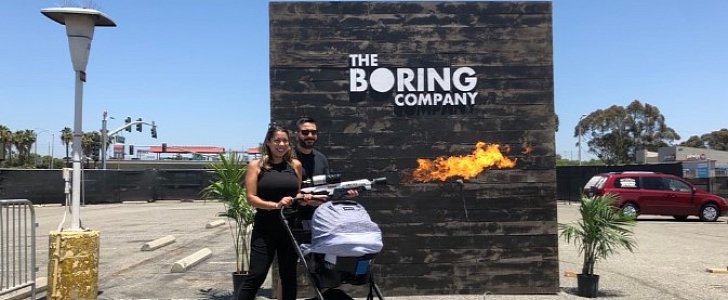 A couple, a baby and a flamethrower