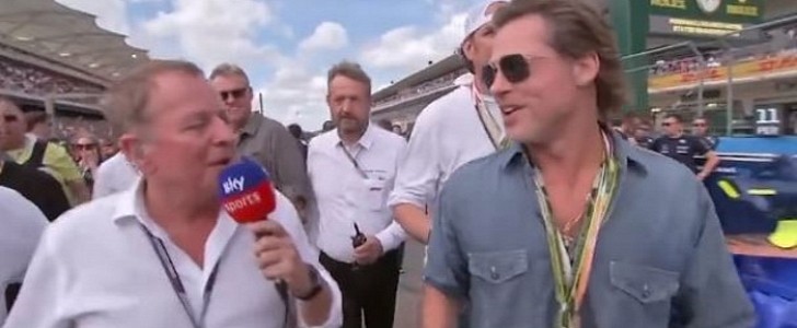 Martin Brundle tries to talk to Brad Pitt at the 2022 U.S. Grand Prix