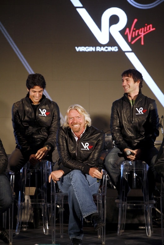 Richard Branson and his two drivers, with whom he's going to tackle the 2010 F1 season