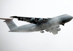 C-5M Super Galaxy Emerges From the Clouds Like a Prehistoric Behemoth