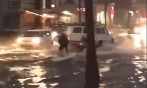 California Surfer Rides Waves on Flooded Streets With Help From Chevy Suburban