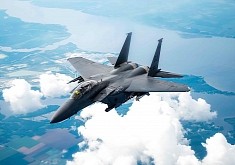 Camera Looks at F-15E Strike Eagle Mid-Flight, Pilots Looks Right Back
