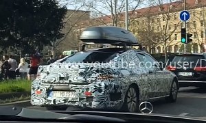 Camouflaged C205 C-Class Coupe Spied Driving through Stuttgart with Roof Box