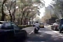 Car Chasing Scooter Crashes into Parked Vehicle