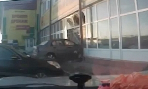 Car Crashes Through Store Window on Purpose in Russia