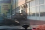 Car Crashes Through Store Window on Purpose in Russia