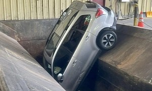 Car Drives Straight Into a Trash Compactor, That's No Place for Scrap Metal