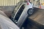 Car Drives Straight Into a Trash Compactor, That's No Place for Scrap Metal