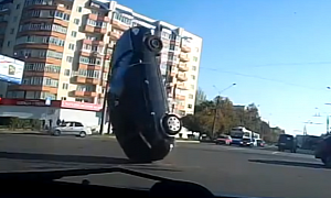 Car Flips Over After Hitting Fallen Cables