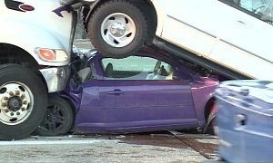 Car Gets Crushed Between SUV And Truck, Driver Walks Away Unharmed