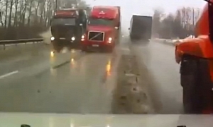 Car Gets Pinned Between Four 18-Wheelers in Russia!