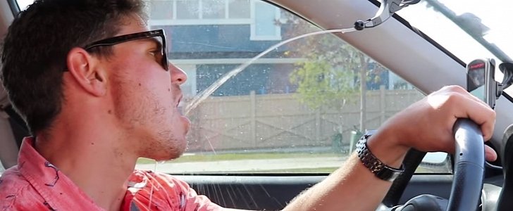 YouTuber modifies windshield wiper to shoot kombucha straight into his mouth as he's driving