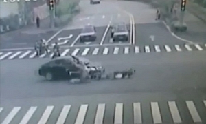 Car Ploughs in Bike Ridden by 5 Chinese Guys
