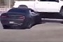 Challenger Hellcat Driver Tries to Look Cool, Flips a Silverado Over Instead