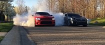 Charger Hellcat Fights Cadillac CTS-V on Winter Tires in Brutal Burnout Standoff