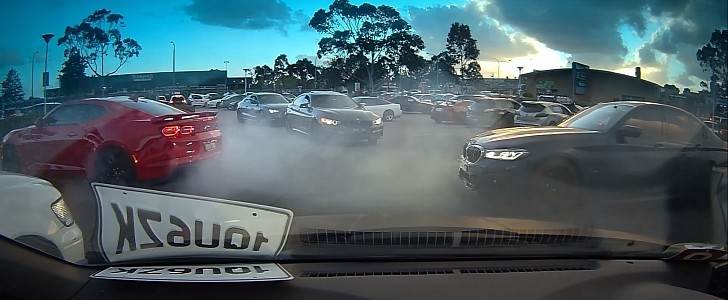 Chevrolet Camaro doing burnout at a car meet in Australia
