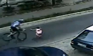 Child Runs in Front of Bicyclist - Results in Spectacular Dive