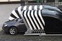 Chinese Company Invents Cocoon Garage That Wraps Around the Car