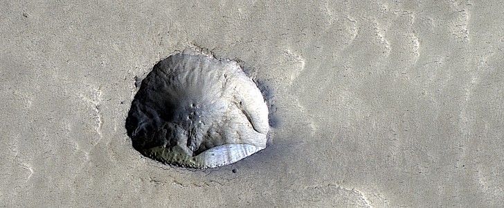 "Chip in the wall" Martian crater