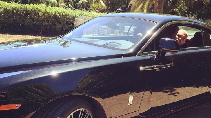 Chris Brown at the wheel of a Rolls-Royce Wraith