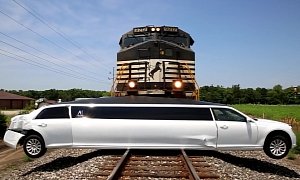 Chrysler 300 Limo Suspended on Tracks Makes For a Brutal Train Crash