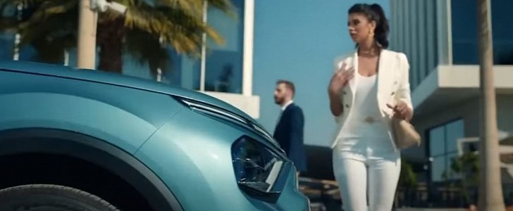 An ad for the CitroenC4 has been pulled because it showed a man taking a woman's photo without her permission