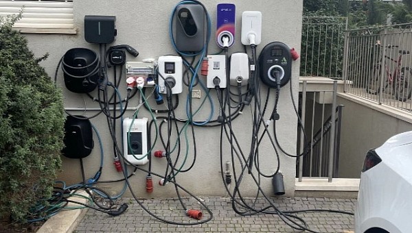 Wall full of charging stations for electric cars