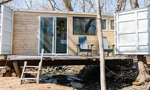 Clever Container Home Sitting Over a Stream Features an Elevator Bed and a Sliding Cabinet