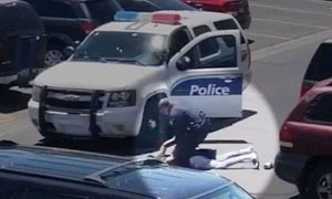 Clip Shows Phoenix Cop Point Gun at Car With Children, Use Excessive Force