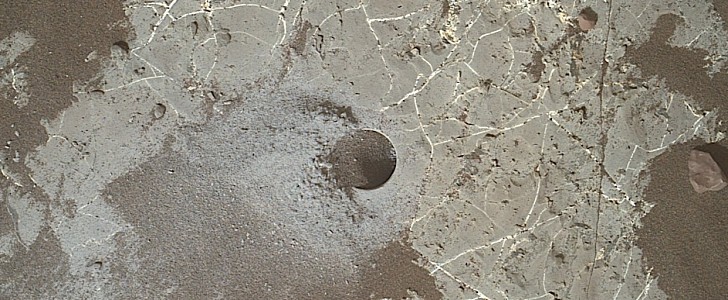 Hole dug by Curiosity rover in the Gale crater