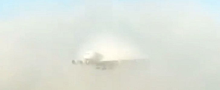 Emirates Airbus A380 emerging from the clouds