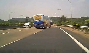 Coach Topples Over on Highway