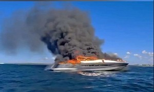 Coastguard Trying to Recover a Luxury Sport Yacht That Sank After a Massive Fire