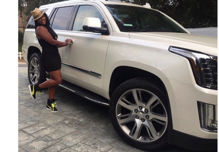 Torrei Hart with her new Cadilac Escalade