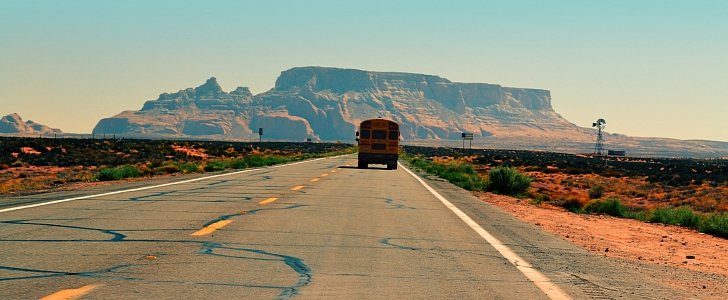 School Bus driving on the road in Utah